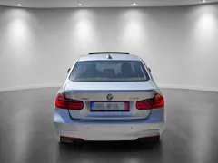 BMW 328i xDrive — Rear view