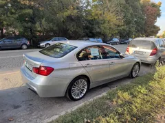 BMW 328i xDrive — Rear view outdoors