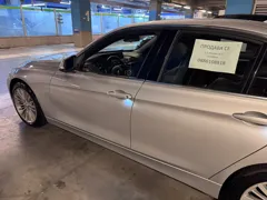 BMW 328i xDrive — Side view