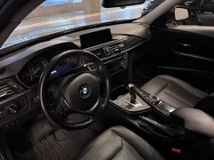 BMW 328i xDrive — Front seats and dashboard