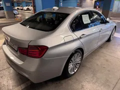BMW 328i xDrive — Rear right view